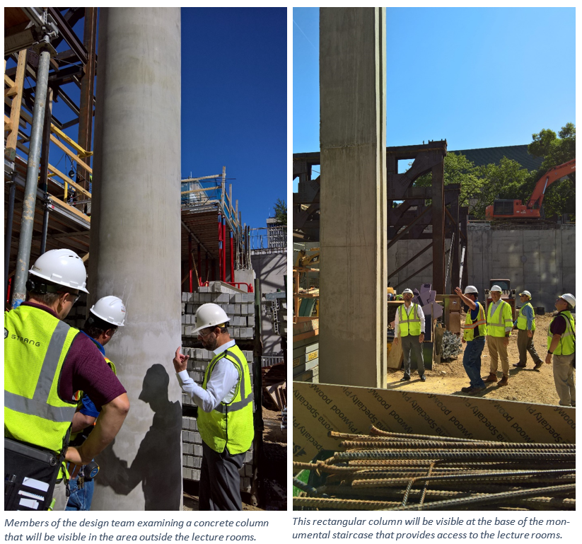 construction workers talking next to a concrete pole