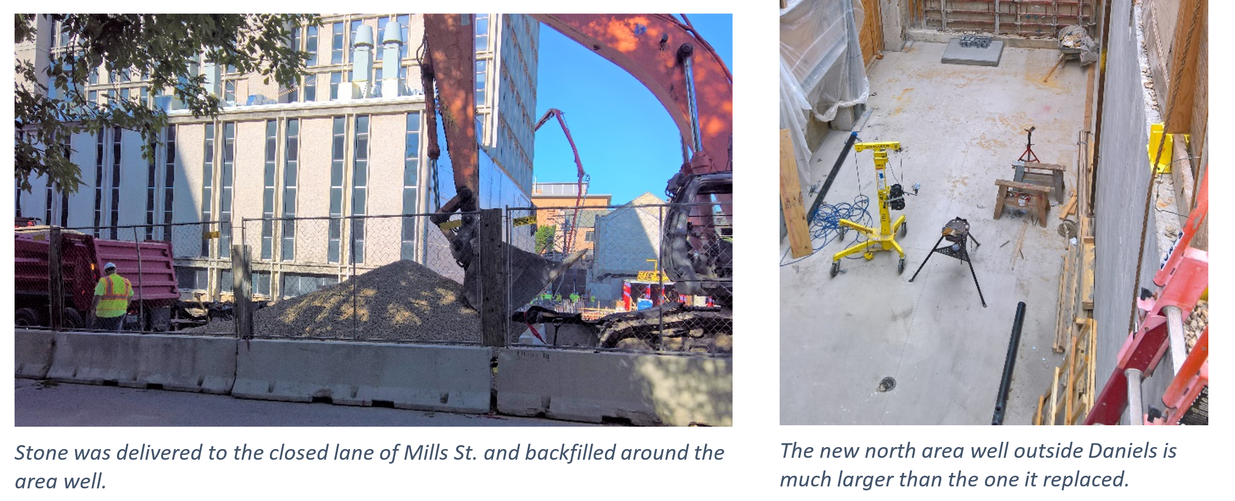 Stone is pushed by a large piece of construction equipment and an area of concrete has walls on three sides.