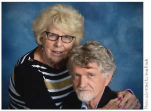 Woman with striped shirt next to man
